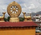 Dharma wheel, top of Jokhang Temple, Lhasa, Tibet, 2011-06-08, by Miro Nankov